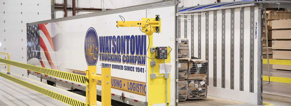 Open-top/flatbed trailer in a warehouse